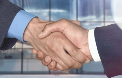 finishing meeting handshake two happy 600nw 1457888075